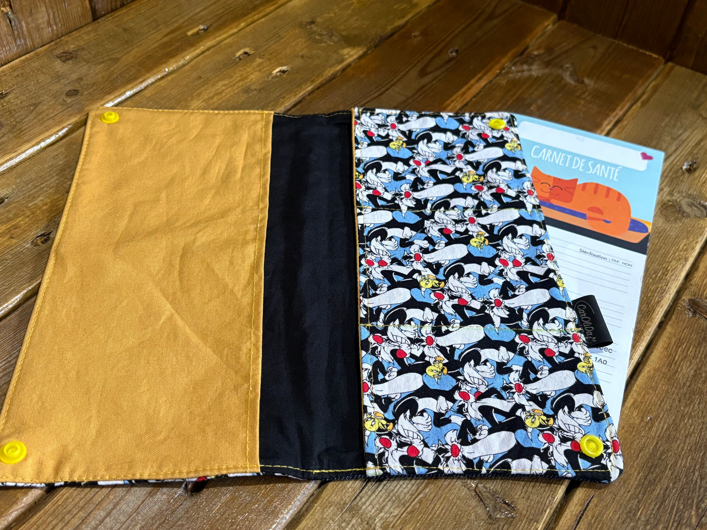 Protège carnet chat, oiseau/jaune